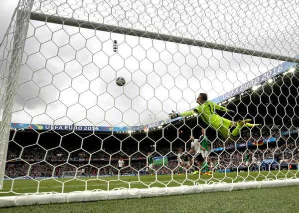 Northern Ireland goalkeeper Michael McGovern in action against Germany.