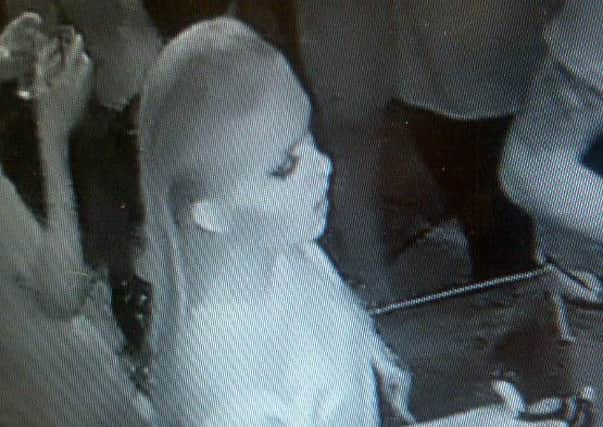 Do you recognise this woman who police want to trace after an assault in a Sheffield bar?