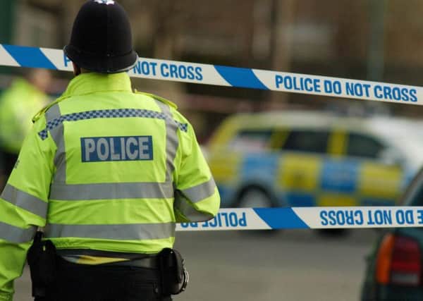 Masked men armed with a machete and a hammer burst into a family home near York.