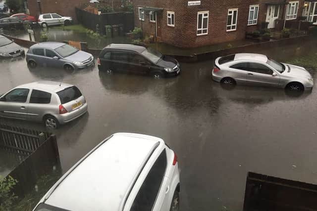 Twitter picture by @jGLOVER79 of heavy overnight rain which left cars stranded in Barking, Essex