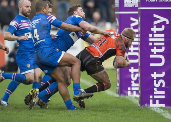 Oliver Holmes, crossing for a try against Wakefield, is aiming to return against Wigan. (Picture: Allan McKenzie)