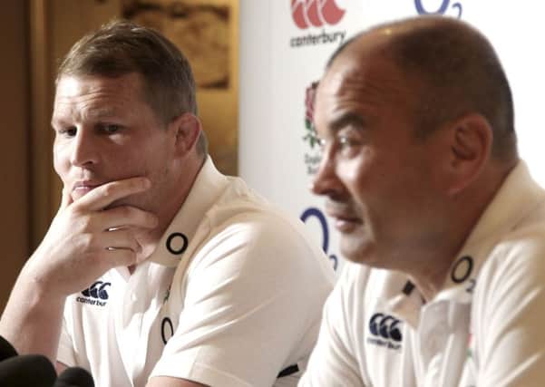 England captain Dylan Hartley, left, listens as head coach Eddie Jones talks to the media ahead of tomorrows final Test with Australia in Sydney (Picture: Rob Griffith/AP).