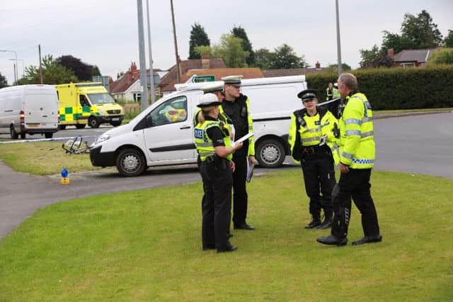 Police at the scene of the incident. Picture: Ross Parry Agency