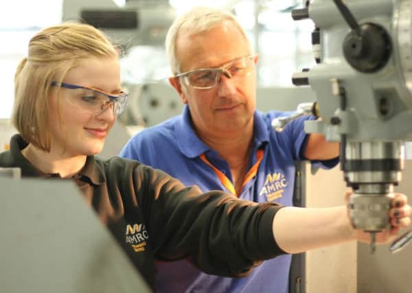 Close Brothers SME Apprentice Programmeone of the AMRCs current apprentices, Rebecca Taylor, and Training Centre trainer Mick Fairman.