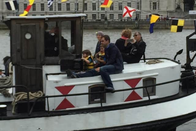 Brendan Cox arrives at Westminster Pier with his two young children Cuillin, five, and Lejla, three.