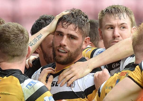 Lee Jewitt celebrates his match-clinching try against former club Wigan Warriors in the 2014 Challenge Cup quarter-final.