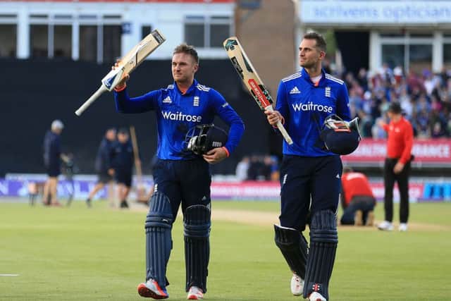 England's Jason Roy (left) and Alex Hales (right) celebrate after finishing not out to beat Sri Lanka at Edgbaston. Picture: Nigel French/PA.
