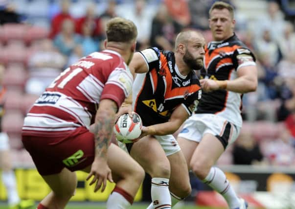 Luke Gale looks for the pass against Wigan Warriors in the Challenge Cup Quarter Final. (Picture: Bruce Rollinson)