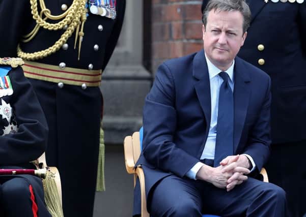 An ashen-faced David Cameron at Saturday's Armed Forces Day parade in Cleethorpes.