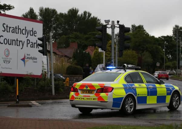 Emergency services at Strathclyde Country Park following a rollercoaster crash at the M&D's amusement park in Motherwell, near Glasgow. PRESS ASSOCIATION Photo. Picture date: Sunday June 26, 2016. Eyewitnesses said the Tsunami ride had been full when it derailed.