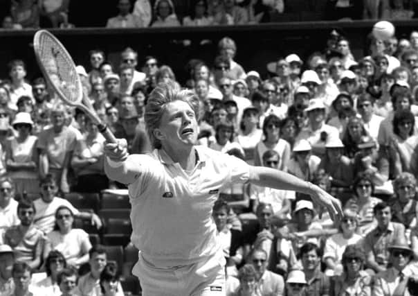 Boris Becker on his way to winning one of his three Wimbledon men's titles in the 1980s. Picture: PA.
