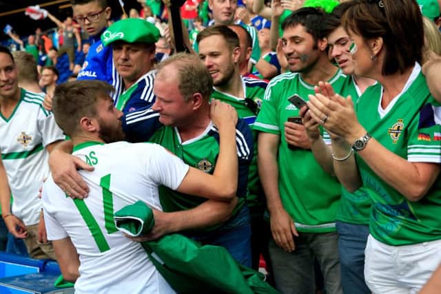 Northern Ireland's Stuart Dallas hugs fans after losing to Wales in Paris. PRESS ASSOCIATION Photo. Picture: Jonathan Brady/PA.