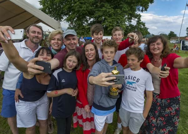 Oscar winning producer Serena Artimage made a surprise visit to the Nun Monkton village fete, near York, to show off her Oscar, to local school children that she won in the short Film Live Action category in this year's 2016 Oscars ceremony, pictured having a selfie with visitors to the fete. Picture: James Hardisty