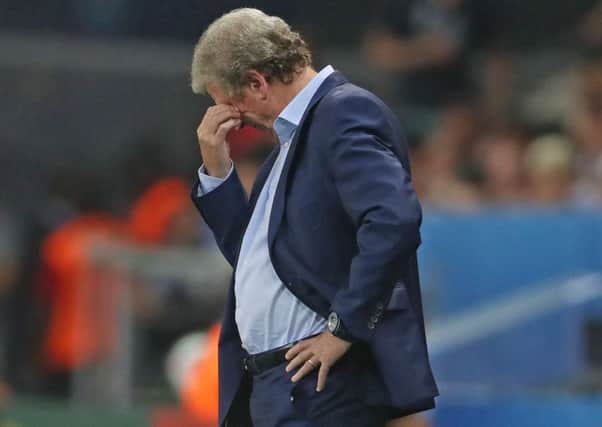 IT'S OVER: England manager Roy Hodgson looks dejected on the touchline