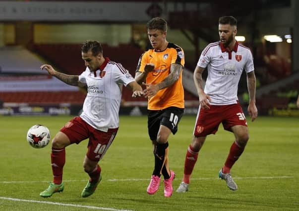 NEW TYKE: George Moncur, in action for Colchester against Sheffield United last season. Picture: 
Sport Image