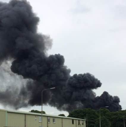 Plumes of smoke rising from the scene of the fire earlier. Picture: Gurdev Singh