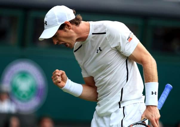 Britains No 1 Andy Murray urges himself on during his second-round victory against Chinese Taipeis Yen-Hsun Lu yesterday at Wimbledon (Picture: John Walton/PA Wire).