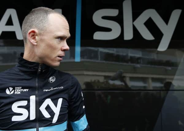 Britain's Chris Froome prepares to leave for a training ride two days before the start of the Tour de France cycling race, near Port-en-Bessin-Huppain, France. (AP Photo/Christophe Ena)