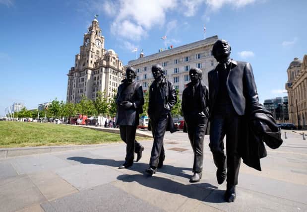 The Beatles bronze statue, unveiled in December last year at Pier Head. Picture: Ian Day