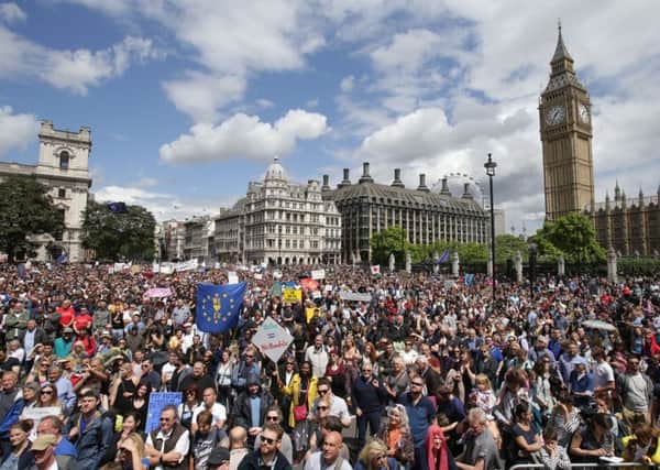 Remain supporters demonstrate during the March for Europe rally in Parliament Square, London, to show their support for the European Union in the wake of Brexit. Photo: Daniel Leal-Olivas/PA Wire