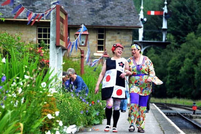 Sisters Sue Macathur (left) and Gillian Humphreys from Bridlington and Pickering  at Levisham Station on the North York Moors Railway for the  Swinging Sixties weekend