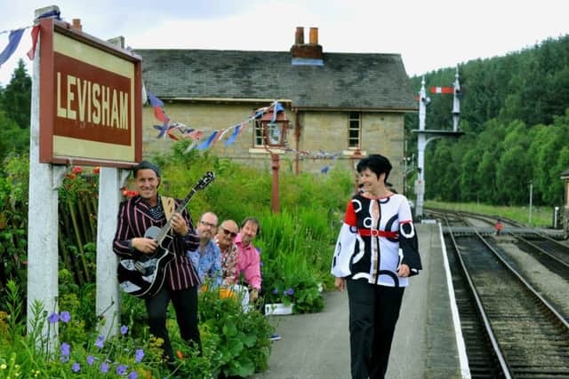 Glen Leon from The New Amen Corner with the rest of the band at Levisham Station on the North York Moors Railway  as part of the Swinging Sixties weekend