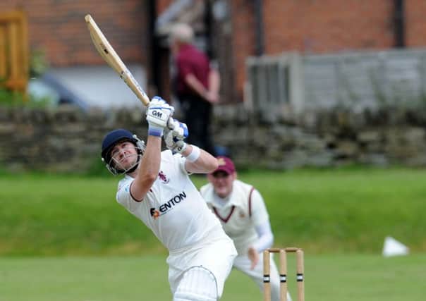 Richard Jubb of Morley finds the boundary with a six as he led the fightback against East Bierley. (Picture: Steve Riding)