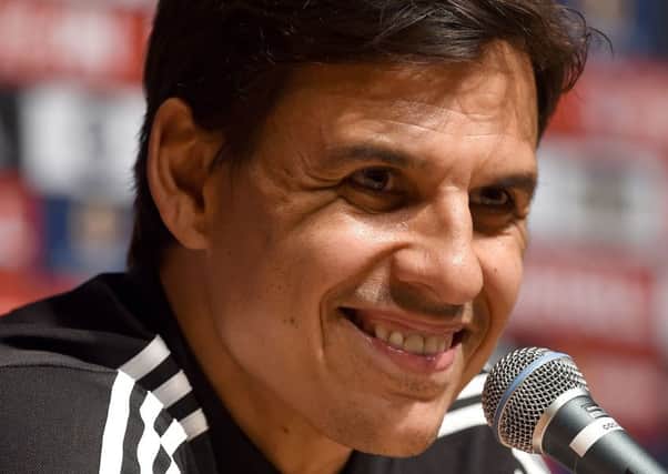 Wales manager Chris Coleman is all smiles as he talks to the media at the Complex sportif du Cosec, Dinard, ahead of his sides Euro2016 semi-final with Portugal on Wednesday (Picture: Joe Giddens/PA Wire).