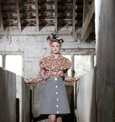 Vintage floral cotton shirt with an A-line skirt designed by Ahroob Jabbar, 20, of Bradford, in her second year studying a BA (Hons) in Fashion at the Bradford School of Art, along with a Frida-Khalo inspired headpiece designed by Husain Patel, of Bradford