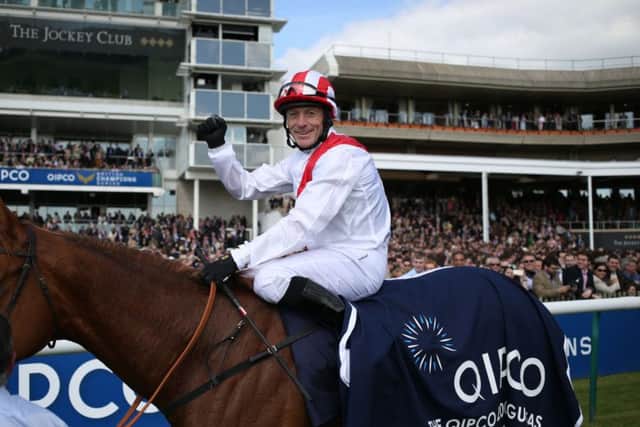 Kieren Fallon celebrates winning the Qipco 2000 Guineas stakes on Night of Thunder in 2014. Picture: Steve Parsons/PA.