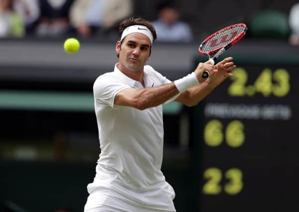 Roger Federer pictured in action against Steve Johnson (Picture: Adam Davy/PA Wire).