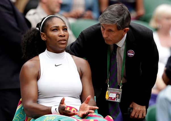 Serena Williams speaks with Tournament Referee Andrew Jarrett about her concerns over Centre Court's slippery surface (Picture: Adam Davy/PA Wire).