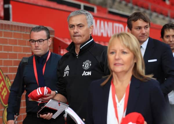 New Manchester United manager Jose Mourinho arrives for a photocall at Old Trafford on Tuesday. Picture: Tim Goode/PA.
