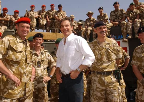 Then Prime Minister Tony Blair meeting troops in the port of Umm Qasr, Iraq, in 2003. Credit: Stefan Rousseau/PA Wire
