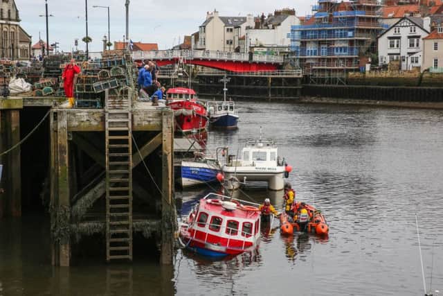 Whitby RNLI launched its inshore lifeboat to assist with a fishing vessel, Stoney Broke, which had sunk in the harbour overnight.


Picture: Ceri Oakes/RNLI