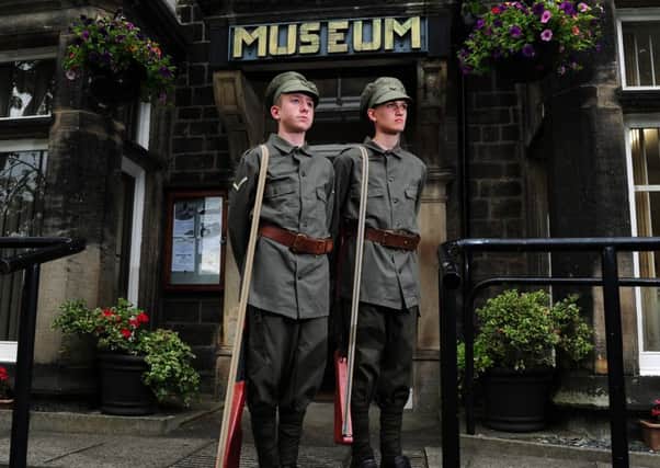 Horsforth School drama students who take part in a play called 'The Pals' wore First World War uniforms during a visit to Horsforth Museum ahead of this Friday's 100th anniversary of the first day of the Battle of the Somme. Pictured Ethan Wright (right) and Joe Moss. Picture : Jonathan Gawthorpe