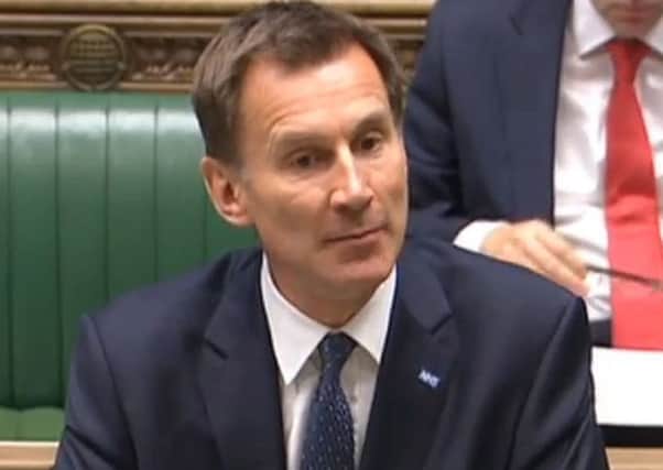 Health Secretary Jeremy Hunt tells MPs that the Government will impose a contract on junior doctors across England.