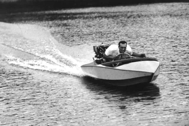 Mr. Reuben Vincent, of Stainburn Drive, Leeds, makes a trial run in his home made hydroplane after launching it on Roundhay Park Lake.

Mr. Vincent built he craft in his spare time. It took him 200 hours and cost Â£28 without the engine.