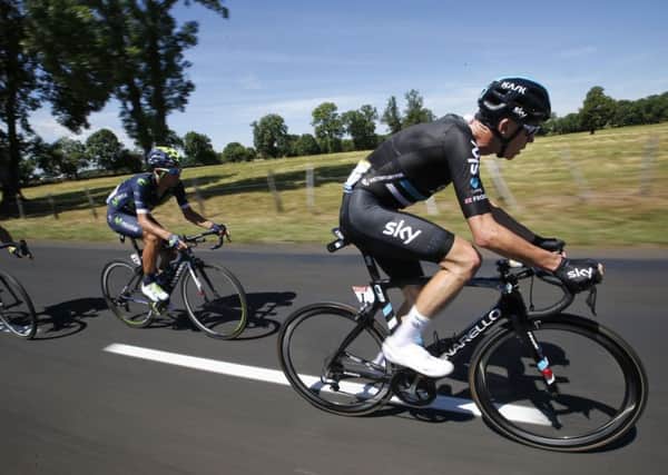 Britain's Chris Froome, right, rides on the pack during the fifth stage of the Tour de France.