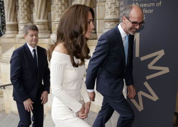 The Duchess of Cambridge is greeted by the Director of the Natural History Museum Sir Michael Dixon, (left), and Art Fund director Stephen Deuchar as she arrives for a dinner at the Natural History Museum in London, where she will present the Art Fund Museum of the Year award. PRESS ASSOCIATION Photo. Picture date: Wednesday July 6, 2016. The Â£100,000 award - the largest museum prize in the world - is given annually to one outstanding museum which has shown exceptional imagination, innovation and achievement.