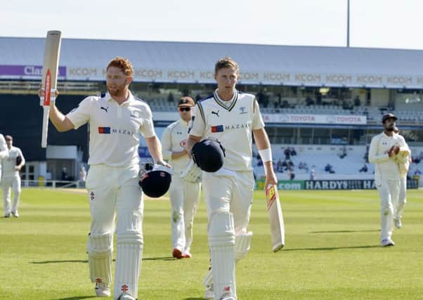 Yorkshire cricketers Jonny Bairstow and Joe Root leave the field at Headingley where redevelopment proposals have run into controversy.