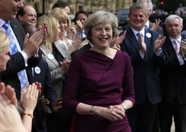 Home Secretary Theresa May makes a statement outside Parliament after winning the support of 199 MPs in the race to become the next Prime Minister.
