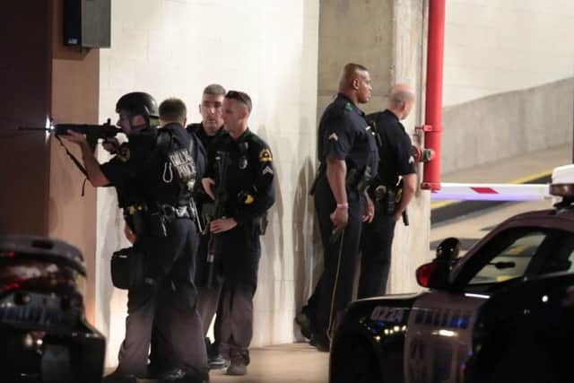 Dallas police respond after shots were fired  during a protest over recent fatal shootings by police in Louisiana and Minnesota. (Maria R. Olivas/The Dallas Morning News via AP)