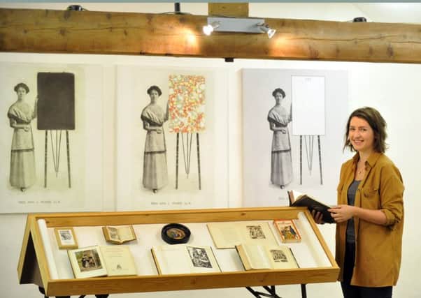 Olivia Threlkeld, exhibitions officer at Shandy Hall, with a copy of  'The Life and Opinions of Tristram Shandy, Gentleman'  part of a new exhibition 'Paint Her to Your Own Mind' at the Shandy Hall Gallery at Coxworld.

Picture: Gary Longbottom