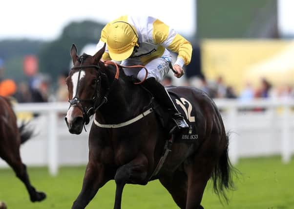 Quiet Reflection ridden by jockey Dougie Costello on the way to winning the Commonwealth Cup during day four of Royal Ascot 2016, at Ascot Racecourse.