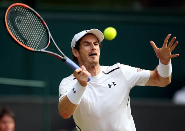 Andy Murray returns on his way to defeating Tomas Berdych (Picture: Steve Paston/PA Wire).