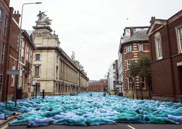People taking part in the Sea of Hull installation by artist Spencer Tunick in Hull. Picture by Danny Lawson/PA Wire

0