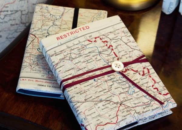 A Homefront Vintage notebook covered with a silk map, Â£25