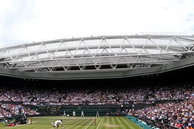 BIG STAGE: Centre Court at Wimbledon, scene of today's men's singles final between Andy Murray and Milos Raonic. Picture: PA.