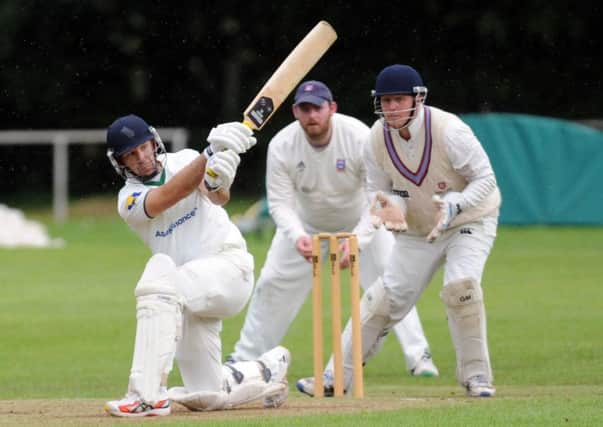 James Middlebrook sweeps four runs during his innings of 71 not out for winners New Farnley, helping his side to a six0wicket win against Pudsey Congs. Picture: Steve Riding.